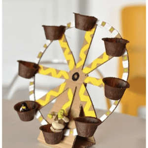 A Upcycled: Fun and Functional Trash Art ferris wheel made out of cupcakes.