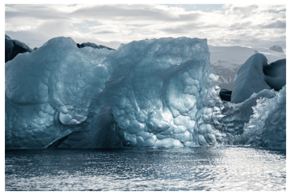 A black and white image of "Are We Melting?" in the water.