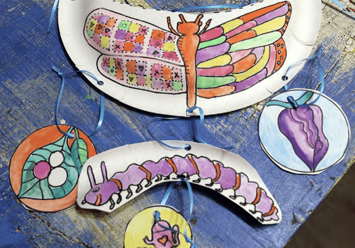 Butterflies and caterpillars paper plate craft, with a message from the president.