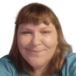 Smiling woman with brown hair and blue shirt.